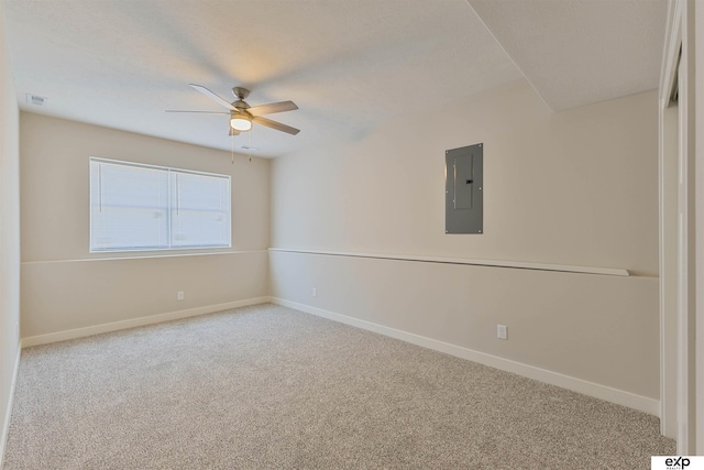 513 13th Ave, Plattsmouth, NE 68048 - carpeted empty room with electric panel, ceiling fan, and baseboards