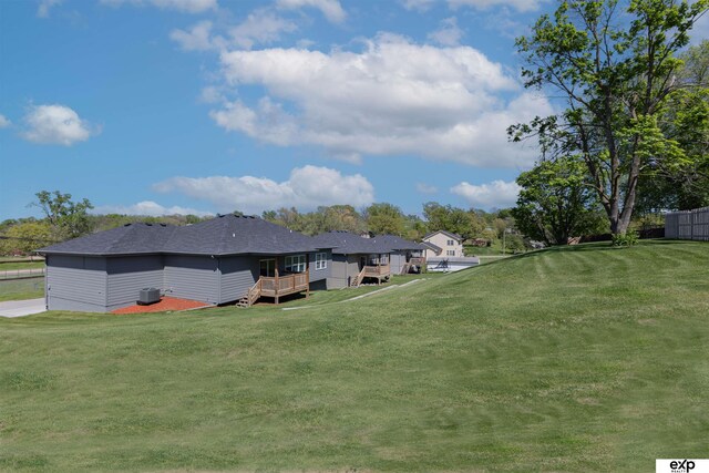 513 13th Ave, Plattsmouth, NE 68048 - view of green lawn with a wooden deck