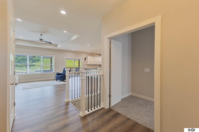 513 13th Ave, Plattsmouth, NE 68048 - corridor with an upstairs landing, dark wood finished floors, recessed lighting, and baseboards