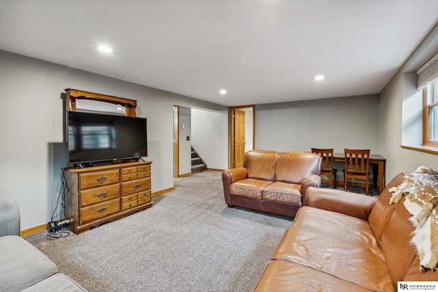 carpeted living room with stairway, recessed lighting, and baseboards