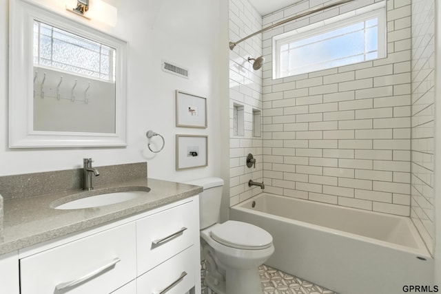 full bath with vanity, toilet, and shower / bathtub combination