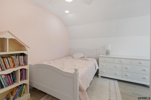 bedroom featuring wood finished floors, lofted ceiling, ceiling fan, and recessed lighting