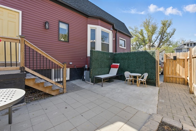 view of patio / terrace featuring fence