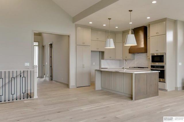 kitchen with oven, wall chimney exhaust hood, built in microwave, light wood-style floors, and recessed lighting