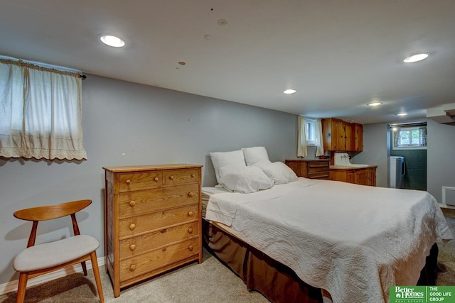 4939 Hickory St, Omaha, NE 68106 - bedroom with recessed lighting, light colored carpet, washer / dryer, and baseboards