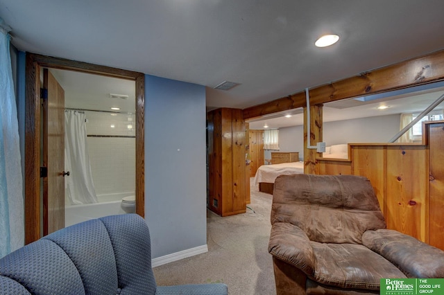 4939 Hickory St, Omaha, NE 68106 - carpeted living area featuring baseboards and recessed lighting
