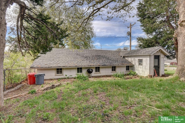 4939 Hickory St, Omaha, NE 68106 - rear view of property featuring roof with shingles