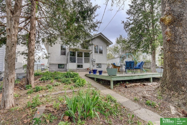 4939 Hickory St, Omaha, NE 68106 - back of property featuring a deck