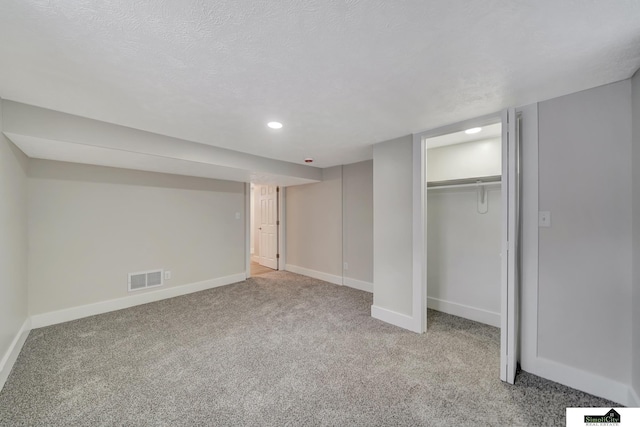 927 Garfield St, Lincoln, NE 68502 - unfurnished bedroom with carpet floors, baseboards, a closet, and recessed lighting