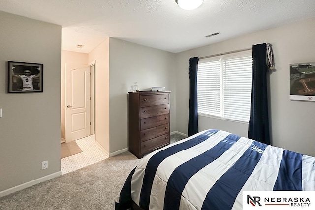 bedroom featuring carpet flooring and baseboards