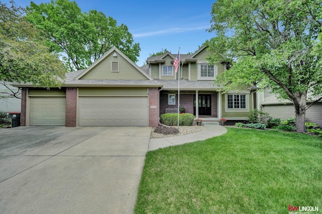 4630 Eagle Ridge Rd, Lincoln, NE 68516 - traditional-style home with an attached garage, concrete driveway, a front lawn, brick siding, and covered porch