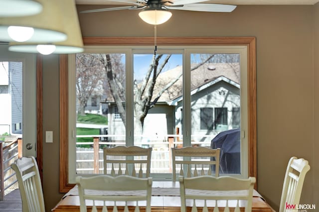 4630 Eagle Ridge Rd, Lincoln, NE 68516 - dining space with ceiling fan and healthy amount of natural light