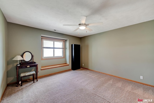 4630 Eagle Ridge Rd, Lincoln, NE 68516 - unfurnished room with baseboards, carpet floors, and ceiling fan