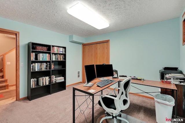 4630 Eagle Ridge Rd, Lincoln, NE 68516 - home office with light carpet, a textured ceiling, and baseboards
