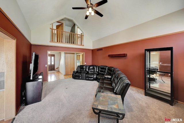 4630 Eagle Ridge Rd, Lincoln, NE 68516 - living area featuring carpet flooring, a ceiling fan, and high vaulted ceiling
