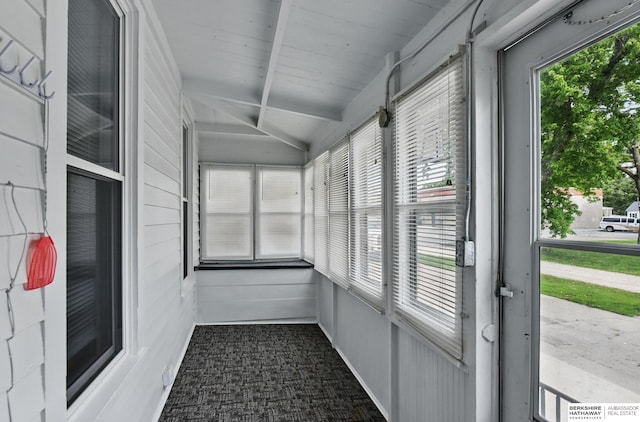 unfurnished sunroom featuring plenty of natural light