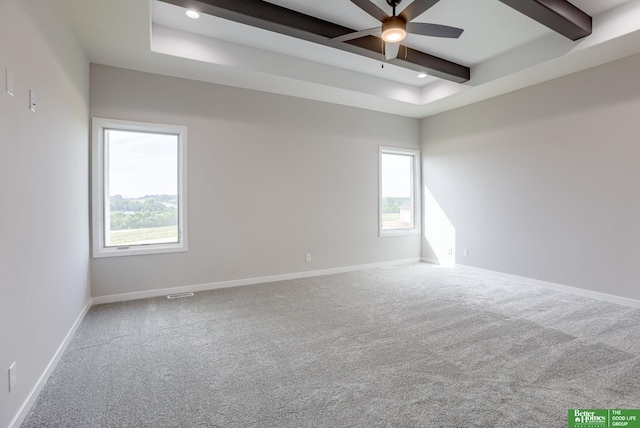 5705 N 197th St, Elkhorn, NE 68022 - carpeted empty room featuring beam ceiling, a ceiling fan, recessed lighting, and a raised ceiling