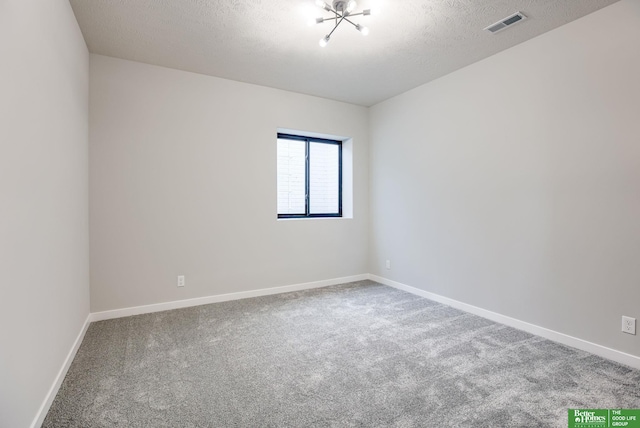 5705 N 197th St, Elkhorn, NE 68022 - unfurnished room with carpet floors and a textured ceiling