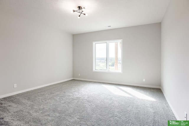 5705 N 197th St, Elkhorn, NE 68022 - carpeted empty room featuring baseboards