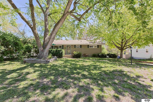 1909 Collins Dr, Bellevue, NE 68005 - view of front of property with a front lawn