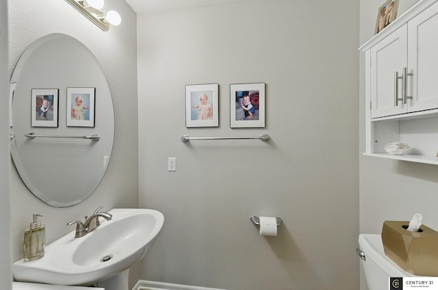 2421 Sand Hills Dr, Papillion, NE 68046 - bathroom featuring toilet and a sink