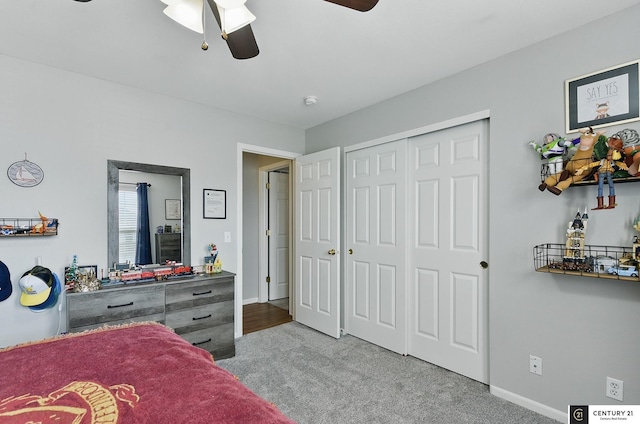 2421 Sand Hills Dr, Papillion, NE 68046 - carpeted bedroom featuring baseboards, ceiling fan, and a closet