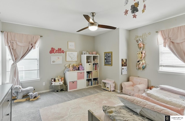 2421 Sand Hills Dr, Papillion, NE 68046 - bedroom featuring carpet flooring, multiple windows, a ceiling fan, and baseboards