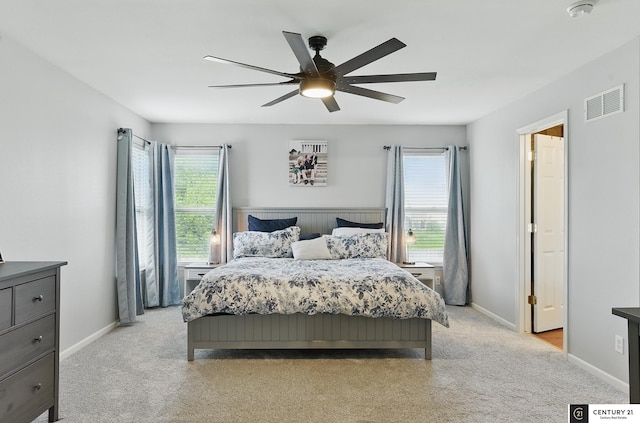 2421 Sand Hills Dr, Papillion, NE 68046 - bedroom featuring light carpet, ceiling fan, and baseboards