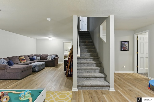 2421 Sand Hills Dr, Papillion, NE 68046 - staircase with wood finished floors and baseboards