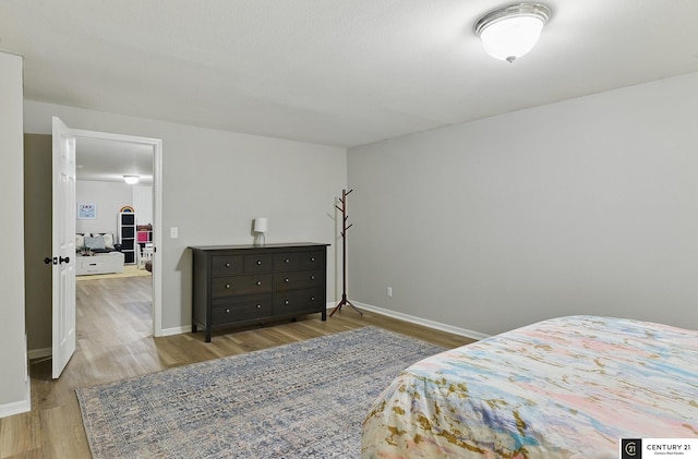 2421 Sand Hills Dr, Papillion, NE 68046 - bedroom with wood finished floors and baseboards