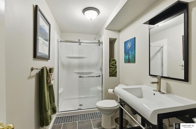 2421 Sand Hills Dr, Papillion, NE 68046 - bathroom with toilet, a stall shower, vanity, and tile patterned flooring