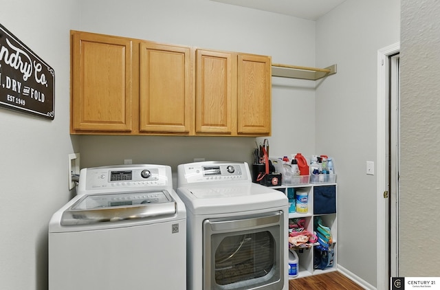 2421 Sand Hills Dr, Papillion, NE 68046 - laundry room with separate washer and dryer, cabinet space, and wood finished floors