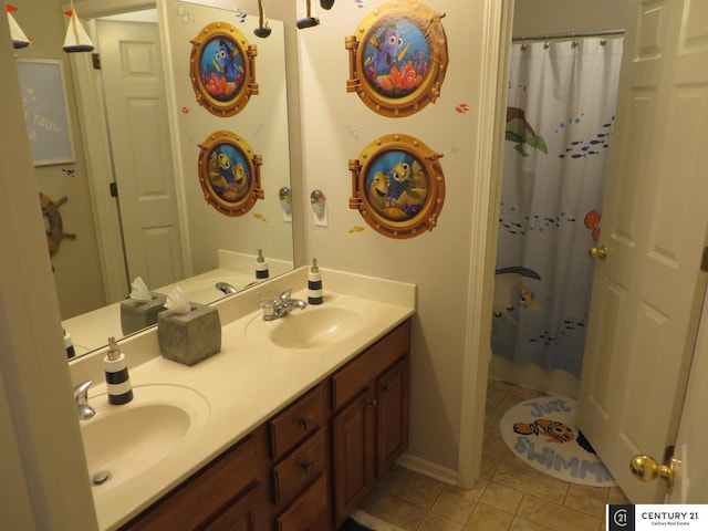 2421 Sand Hills Dr, Papillion, NE 68046 - full bath with tile patterned floors, double vanity, and curtained shower