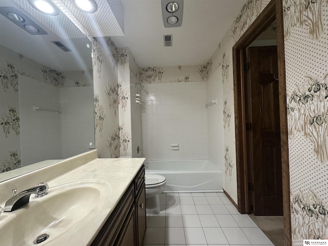 1605 S 113th Plz, Omaha, NE 68144 - full bathroom with tile patterned floors, toilet, vanity, and shower / washtub combination
