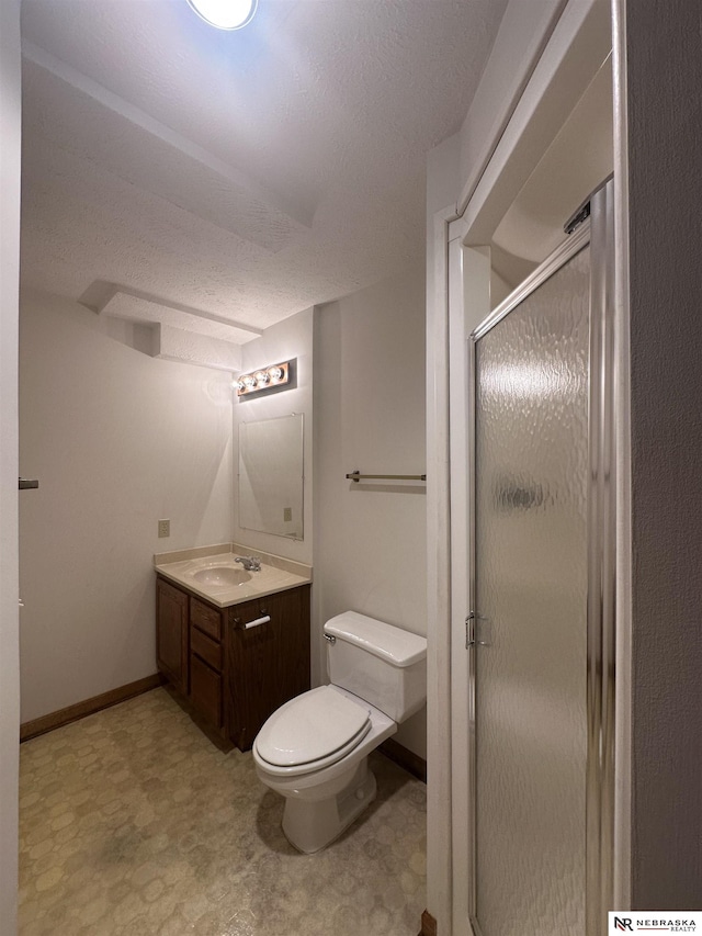 1605 S 113th Plz, Omaha, NE 68144 - full bath with a stall shower, vanity, baseboards, tile patterned floors, and toilet