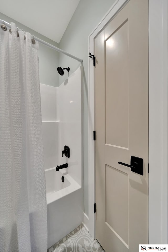 612 N 107th St, Lincoln, NE 68527 - full bathroom featuring shower / tub combo with curtain and tile patterned floors
