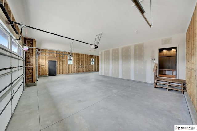 612 N 107th St, Lincoln, NE 68527 - garage featuring a garage door opener