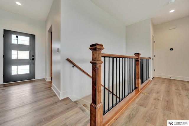 612 N 107th St, Lincoln, NE 68527 - foyer with plenty of natural light, light wood-style flooring, baseboards, and recessed lighting