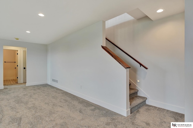 612 N 107th St, Lincoln, NE 68527 - staircase featuring carpet floors, recessed lighting, and baseboards