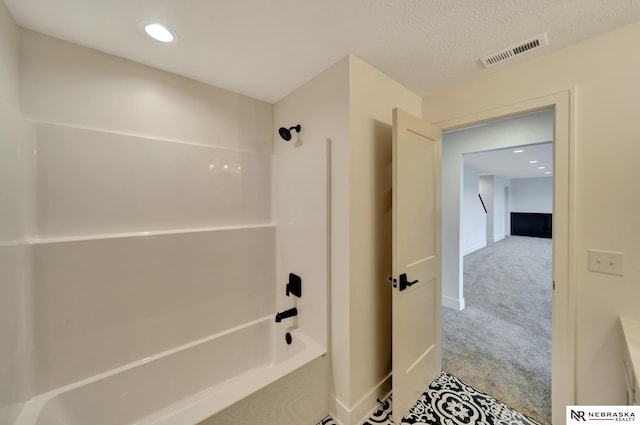 612 N 107th St, Lincoln, NE 68527 - full bathroom featuring baseboards,  shower combination, and recessed lighting