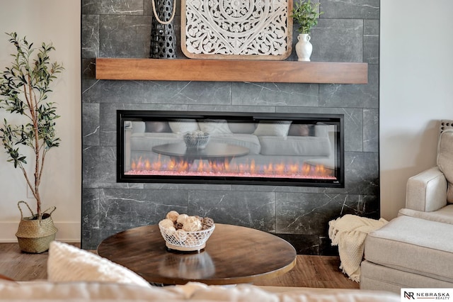 612 N 107th St, Lincoln, NE 68527 - detailed view of a tile fireplace and wood finished floors