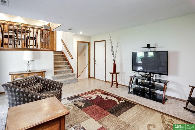 living room with stairway, baseboards, and recessed lighting