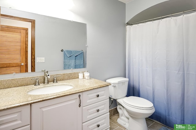 full bathroom with toilet, vanity, tile patterned floors, and a shower with curtain