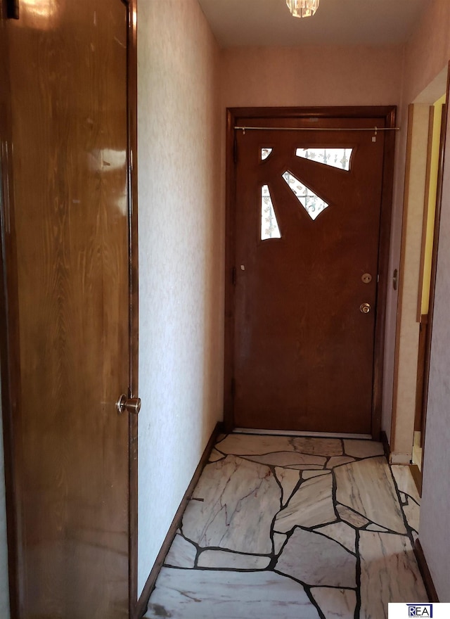 14930 Holmes St, Omaha, NE 68137 - entryway featuring baseboards