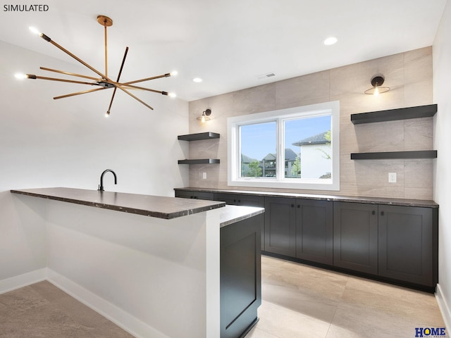 kitchen featuring open shelves, decorative backsplash, recessed lighting, baseboards, and a peninsula