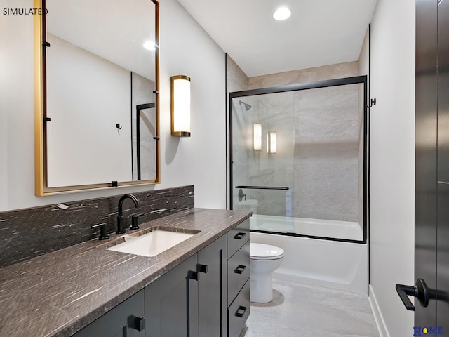 full bath featuring vanity, bath / shower combo with glass door, toilet, and recessed lighting