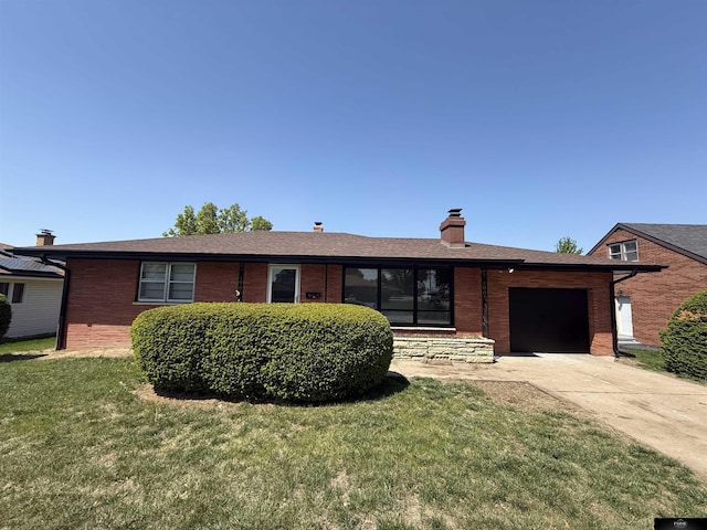 single story home featuring driveway, a garage, a chimney, and a front lawn
