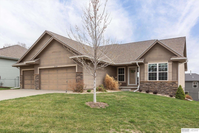 ranch-style home featuring stone siding, concrete driveway, a garage, a front lawn, and roof with shingles