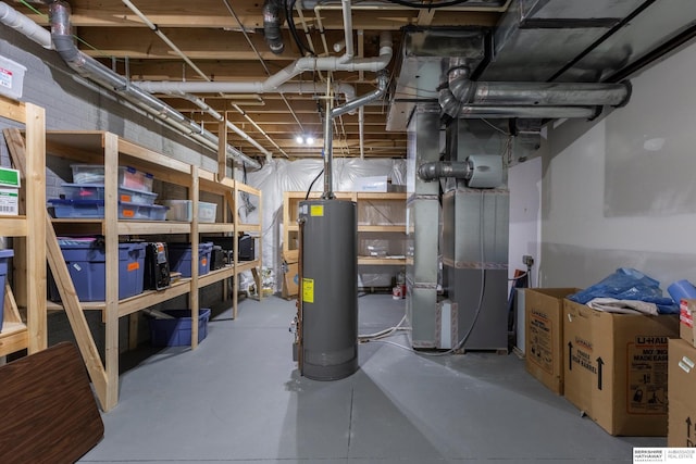unfinished basement with gas water heater and heating unit