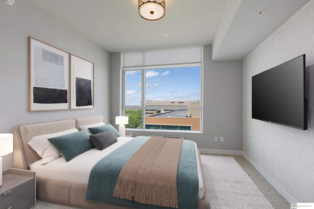 444 Riverfront Plz Unit 801, Omaha, NE 68102 - bedroom featuring carpet and baseboards